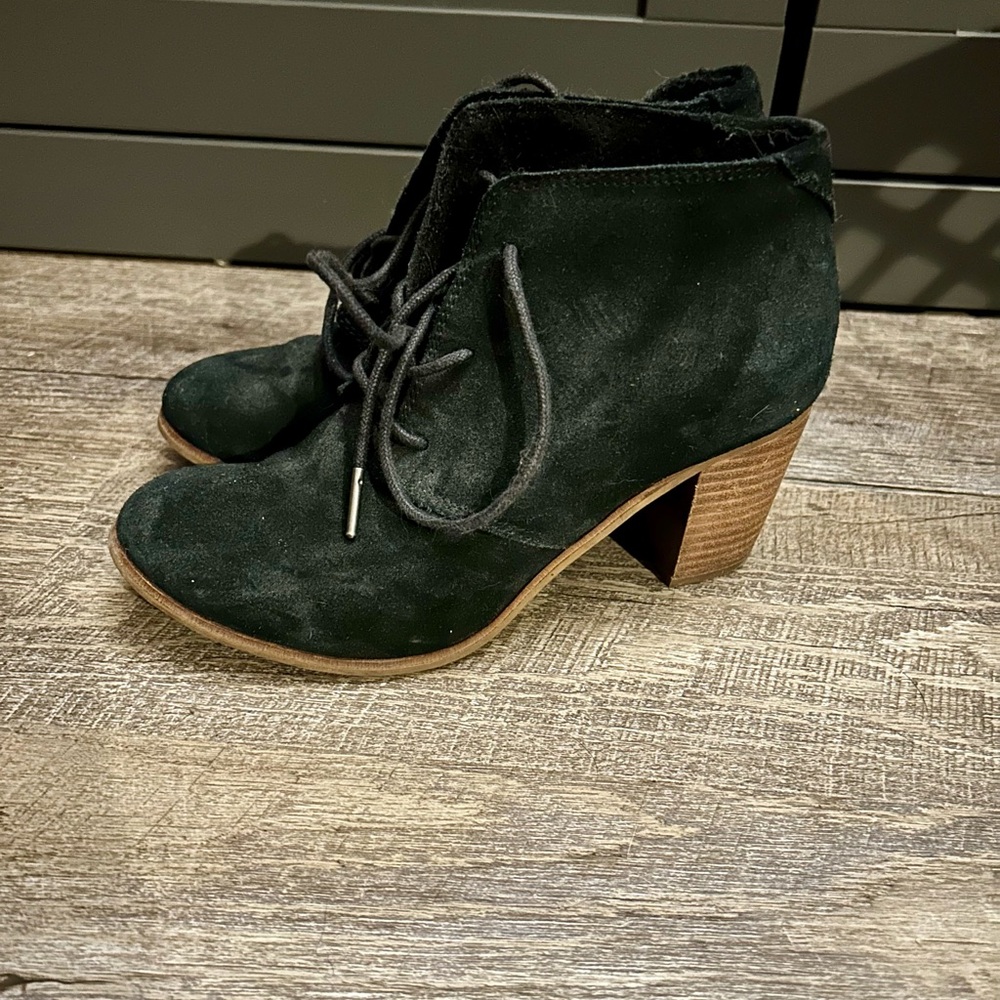 Women’s size 7, black suede Tom’s heeled booties.